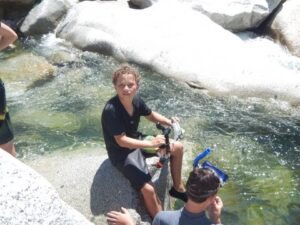 A local twelve year-old gets ready to explore the currents of the South Yuba River.