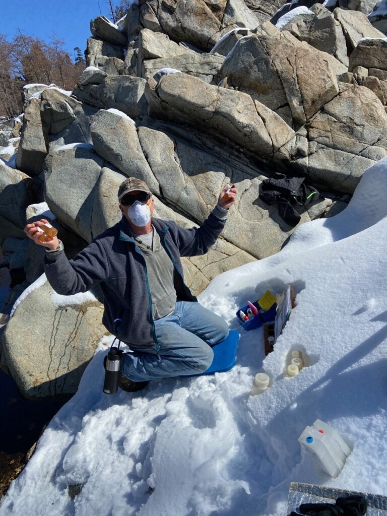 River Monitor measuring dissolved oxygen content on a snowy riverbank of the S Yuba River