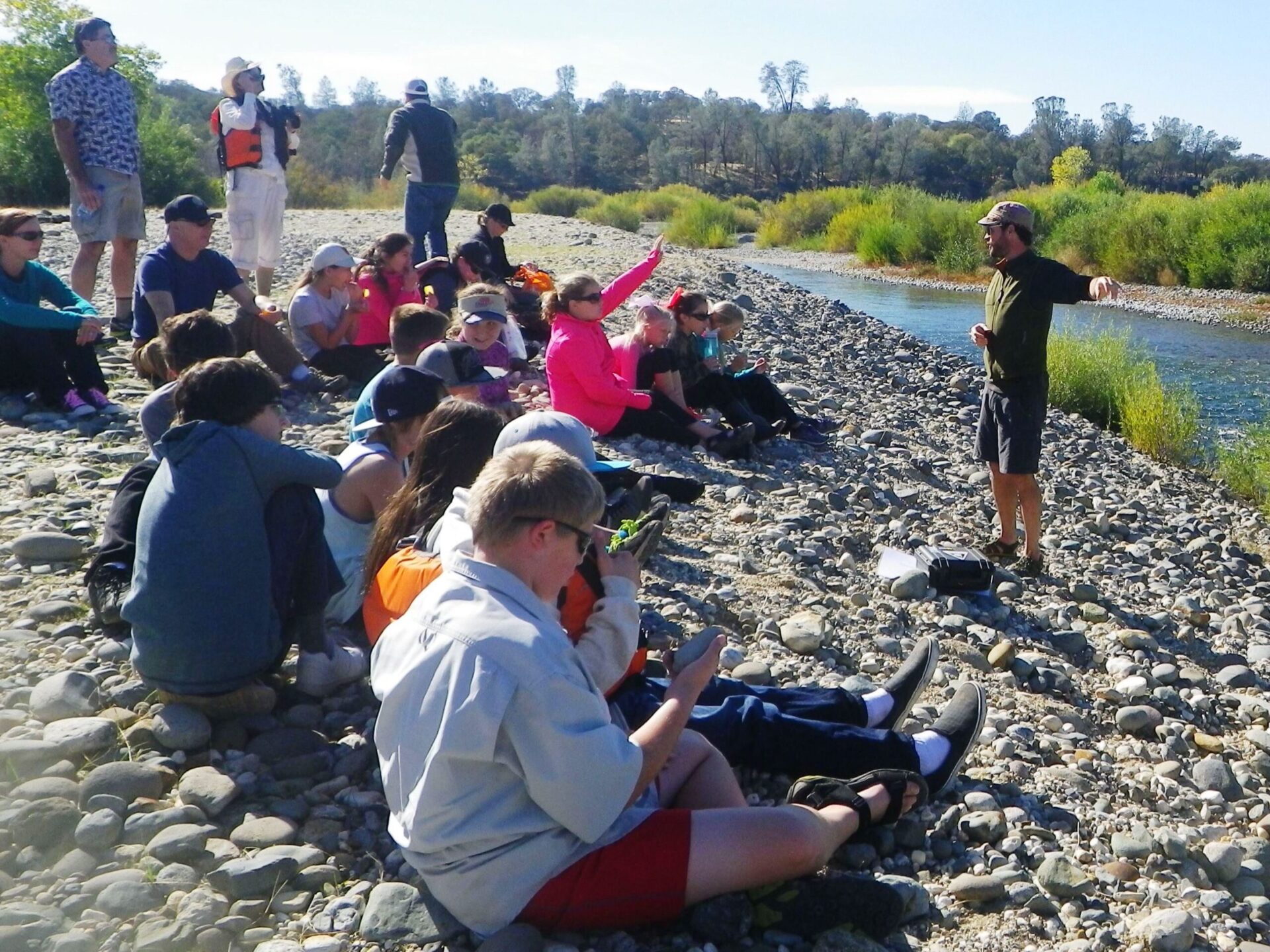 Salmon life cycle lesson on the Yuba Riverbank (Photo: Kelly Hickman)